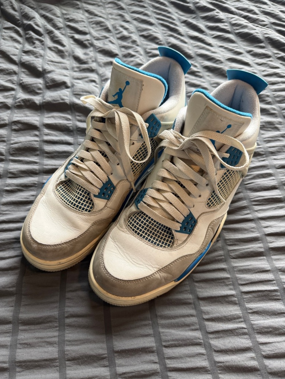 Air Jordan 4 Men’s White and Blue Retro Sneakers
